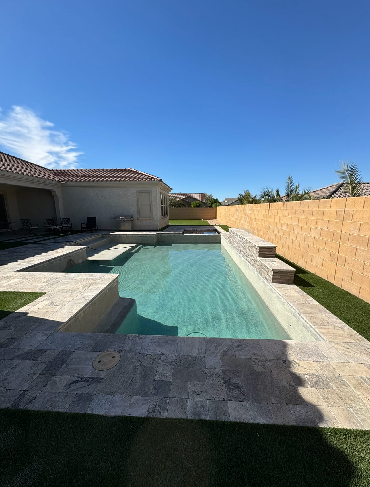 Clean inviting backyard pool on a sunny Arizona day