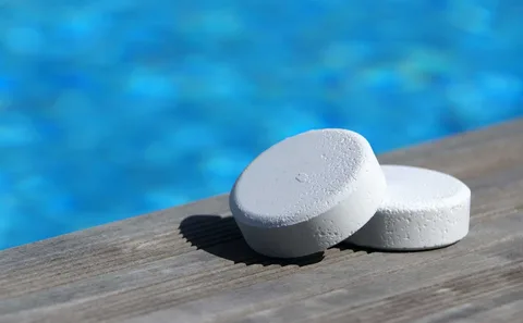 Pool surface being treated with a chlorine wash